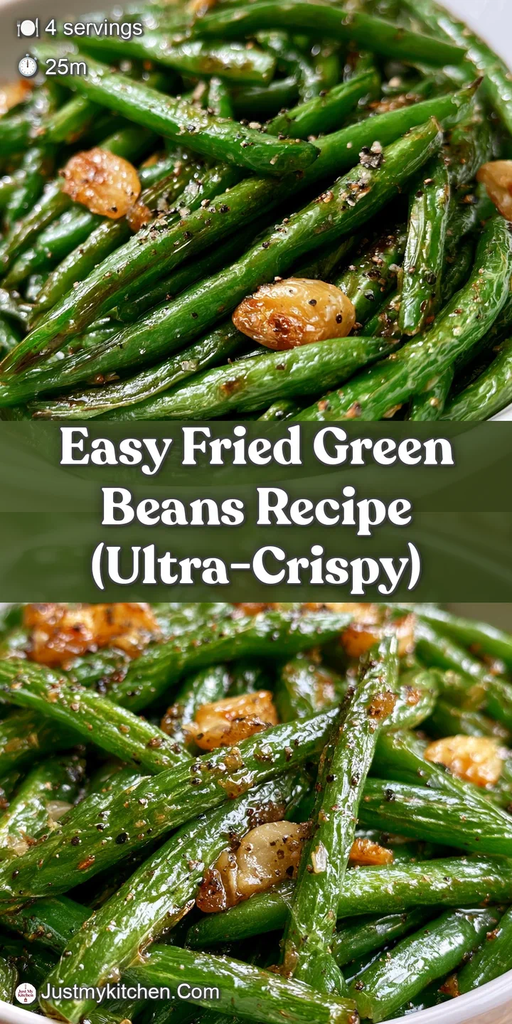 Close-up of crunchy, golden-brown breading on a green bean, with visible salt crystals and a light steam rising.