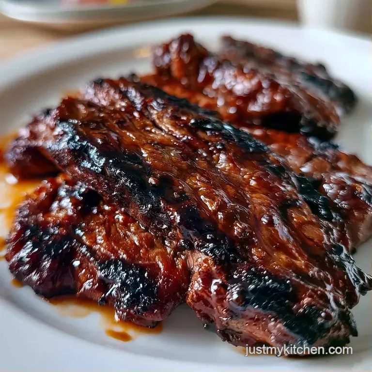 Thinly sliced glazed beef arranged on a white platter with steamed bok choy and a side of fluffy white jasmine rice.